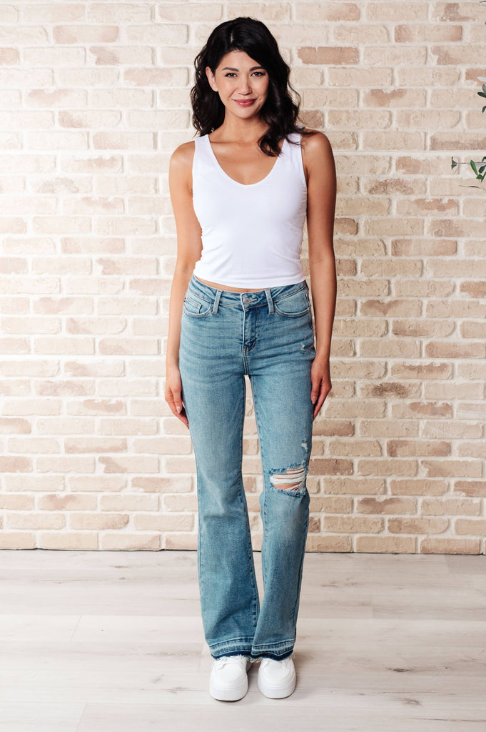 Judy Blue Mid Rise Distressed Released Hem Bootcut Jeans: 3/26